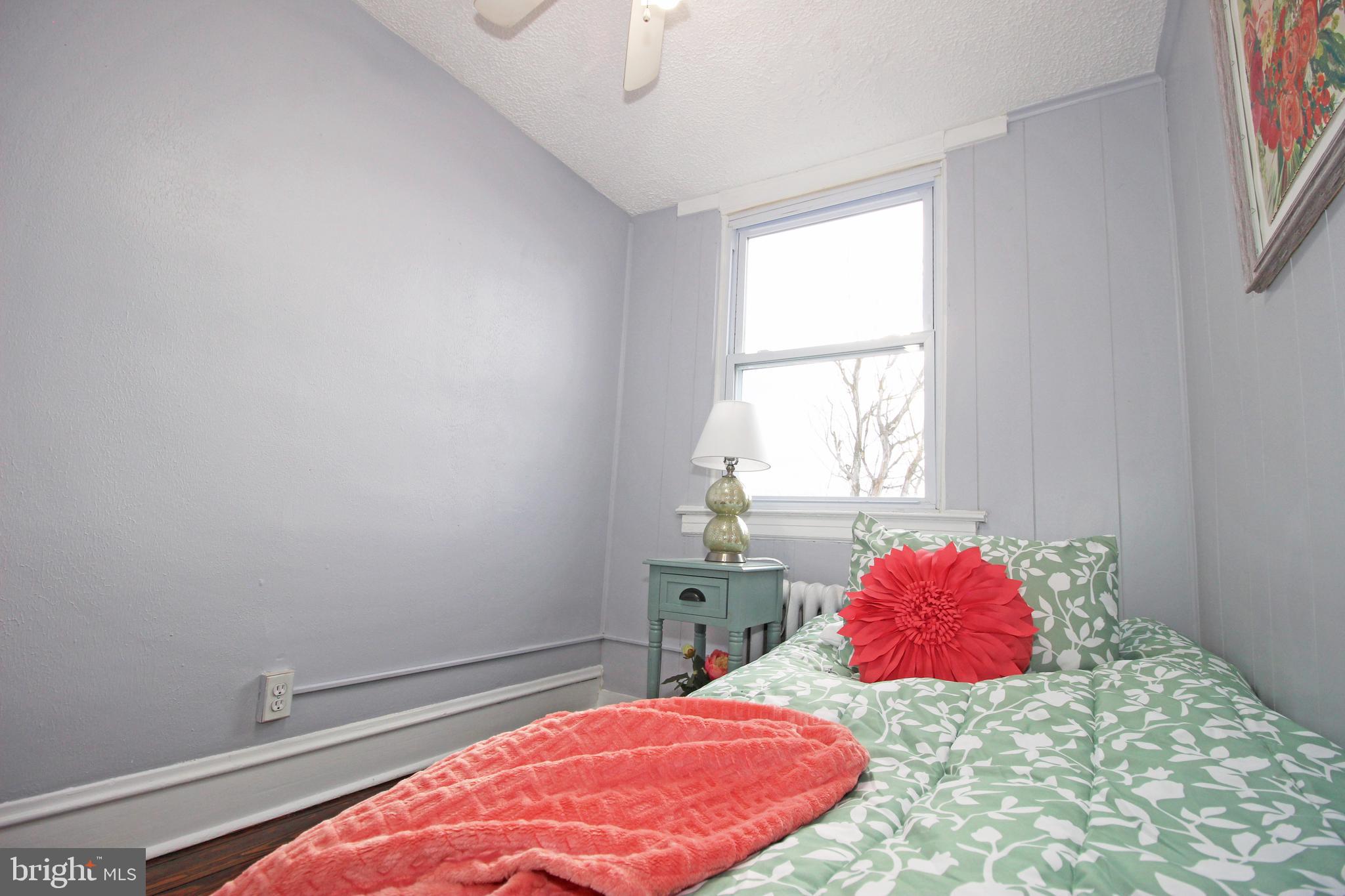 228 Guilford Road Lansdowne, PA 19050 - Photo 44 of 54 a bedroom with a bed and a window