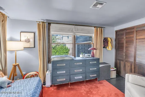 a room with furniture and a window