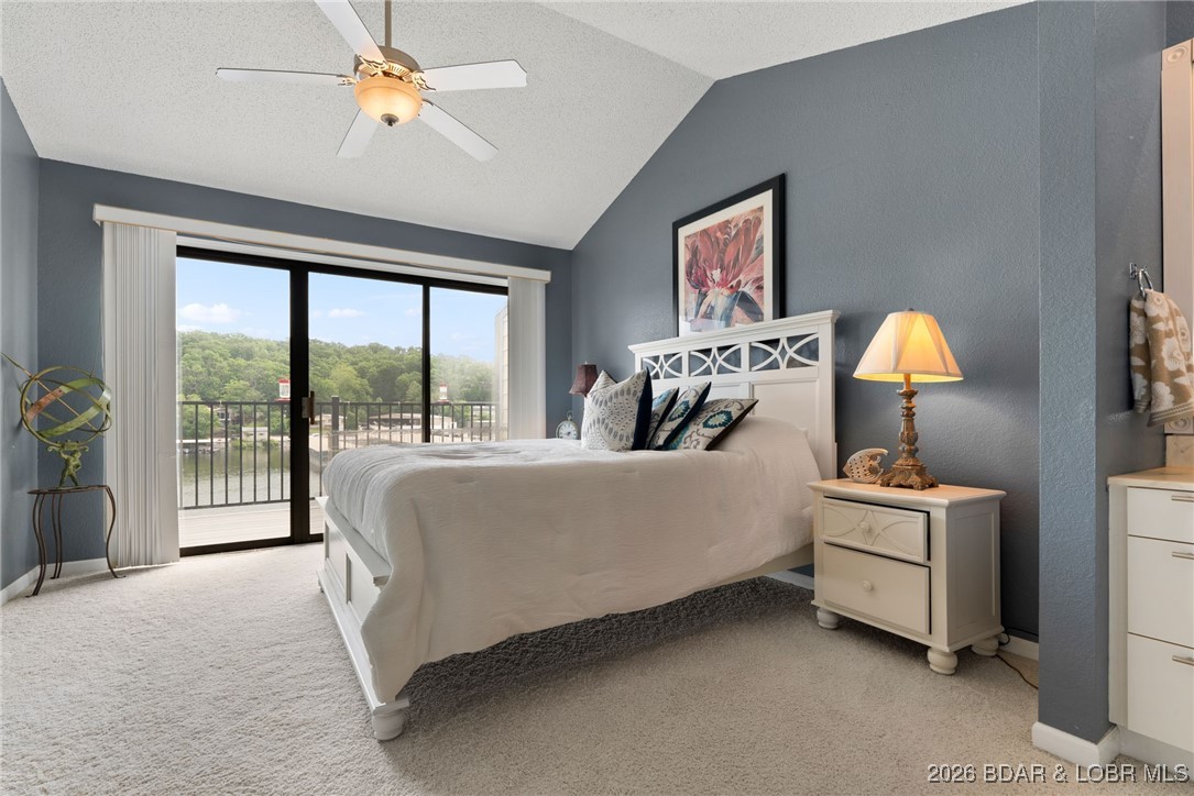 80 Willow Ridge Road, Unit 3A Lake Ozark, MO 65049 - Photo 14 of 37 Lakeiside master bedroom.