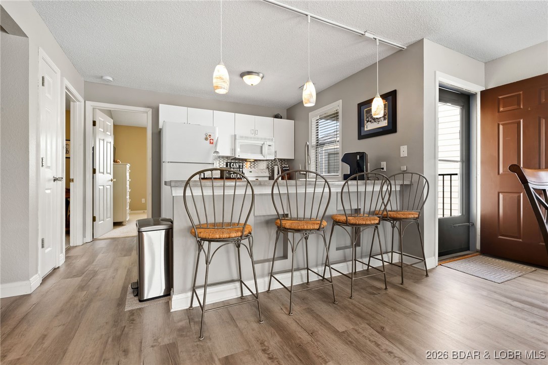 80 Willow Ridge Road, Unit 3A Lake Ozark, MO 65049 - Photo 10 of 37 Brand new flooring.