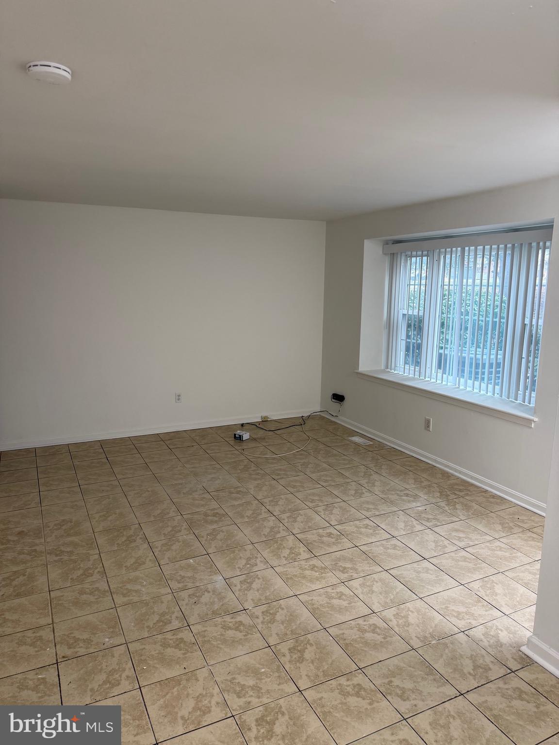 9753 Whiskey Run Laurel, MD 20723 - Photo 5 of 16 a view of an empty room and window