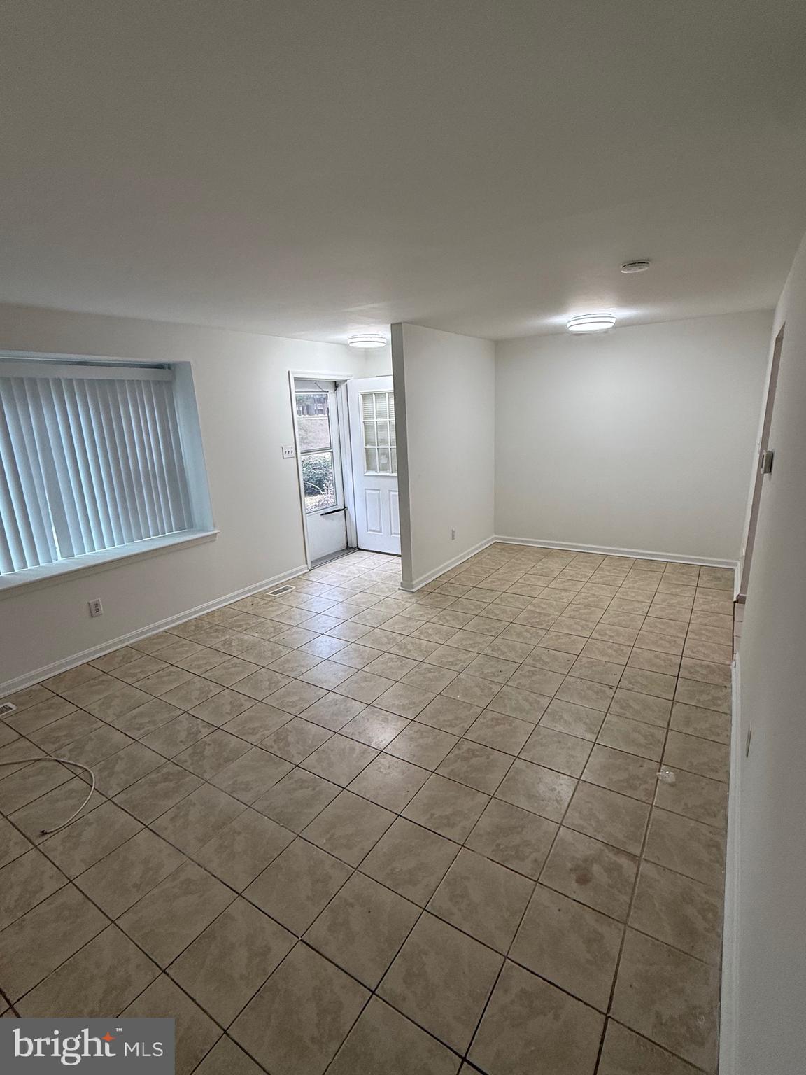 9753 Whiskey Run Laurel, MD 20723 - Photo 9 of 16 a view of an empty room and window
