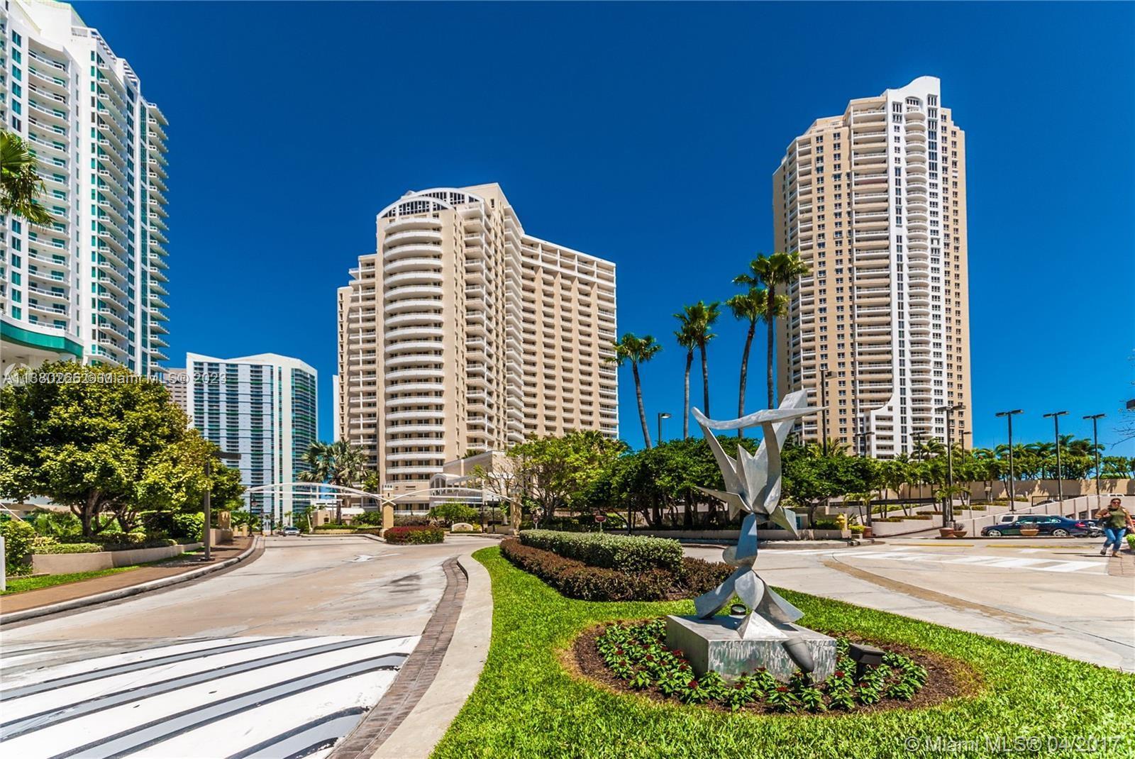 888 Brickell Key Drive, Unit 511 Miami, FL 33131 - Photo 23 of 26 a front view of a multi story building