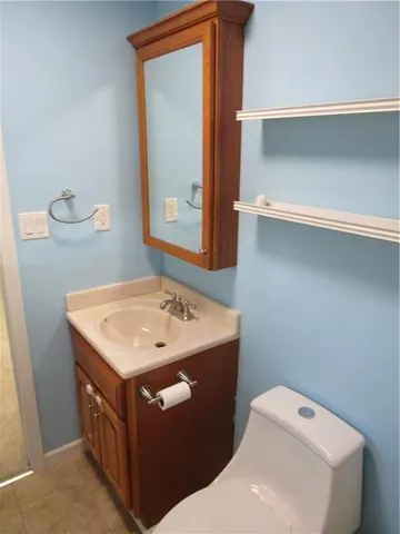 a bathroom with a sink a toilet and a bathtub