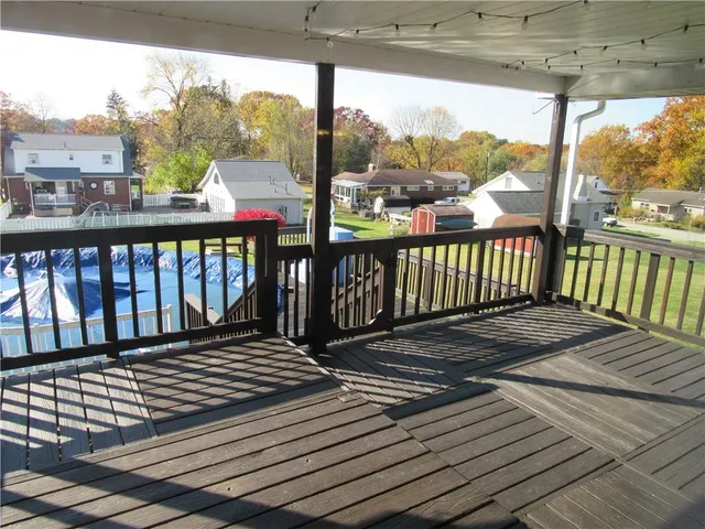 a view of a swimming pool with lounge chair