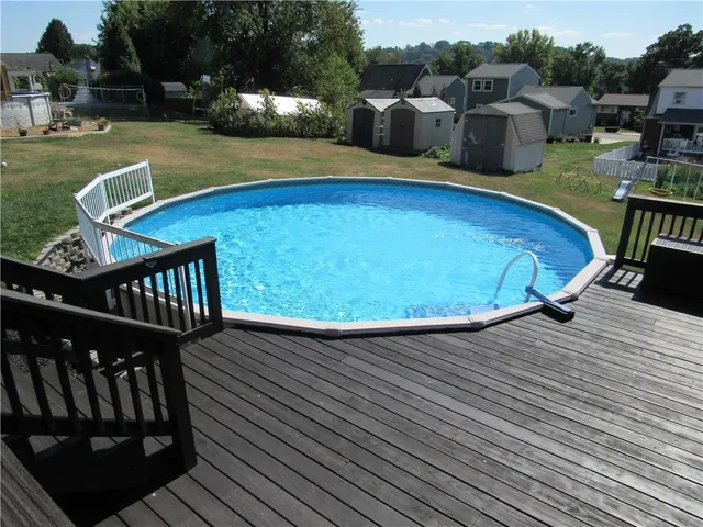 a view of swimming pool and deck