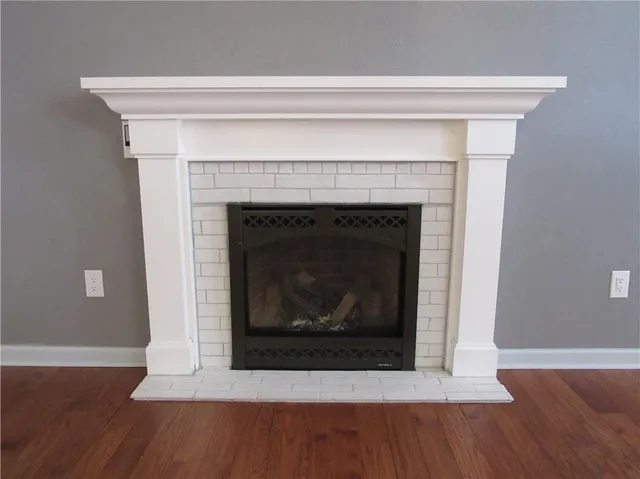 a living room with a fireplace