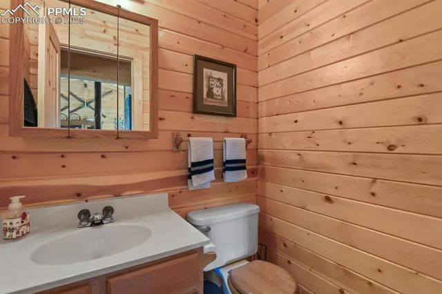 a bathroom with a toilet and a sink
