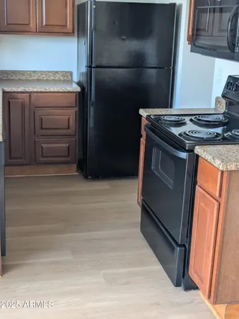 a bathroom with a sink a toilet and bathtub