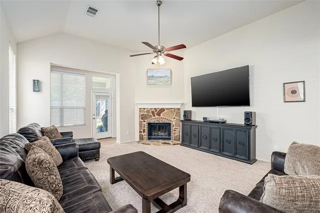 a kitchen with a sink and a refrigerator
