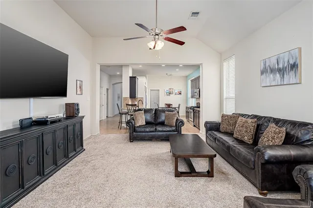 a view of a hallway with seating area