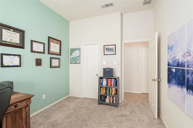a spacious bathroom with a granite countertop sink a mirror and a