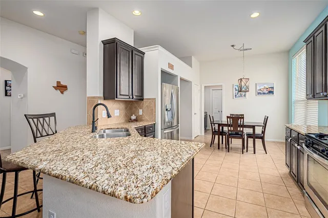 a picture of a bathroom with a shower