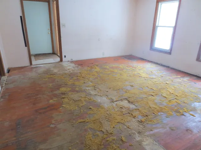 an empty room with windows