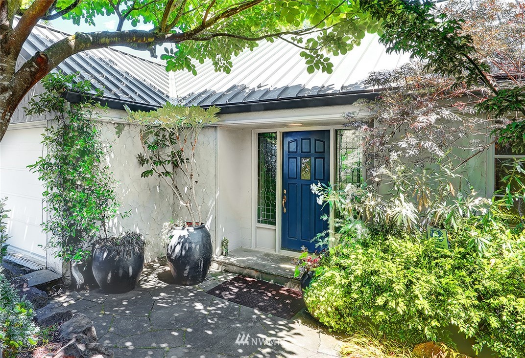 1668 East Boston Terrace Seattle, WA 98112 - Photo 2 of 24 a view of a house with potted plants