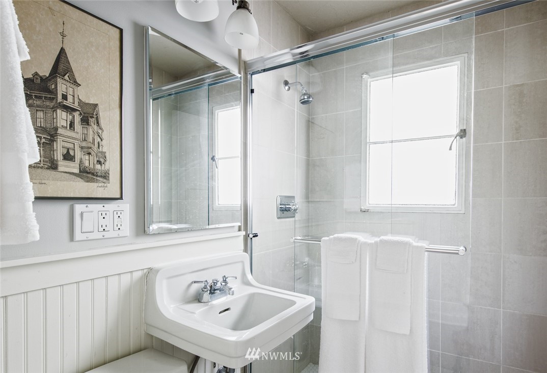 1668 East Boston Terrace Seattle, WA 98112 - Photo 11 of 24 a bathroom with a sink and a mirror