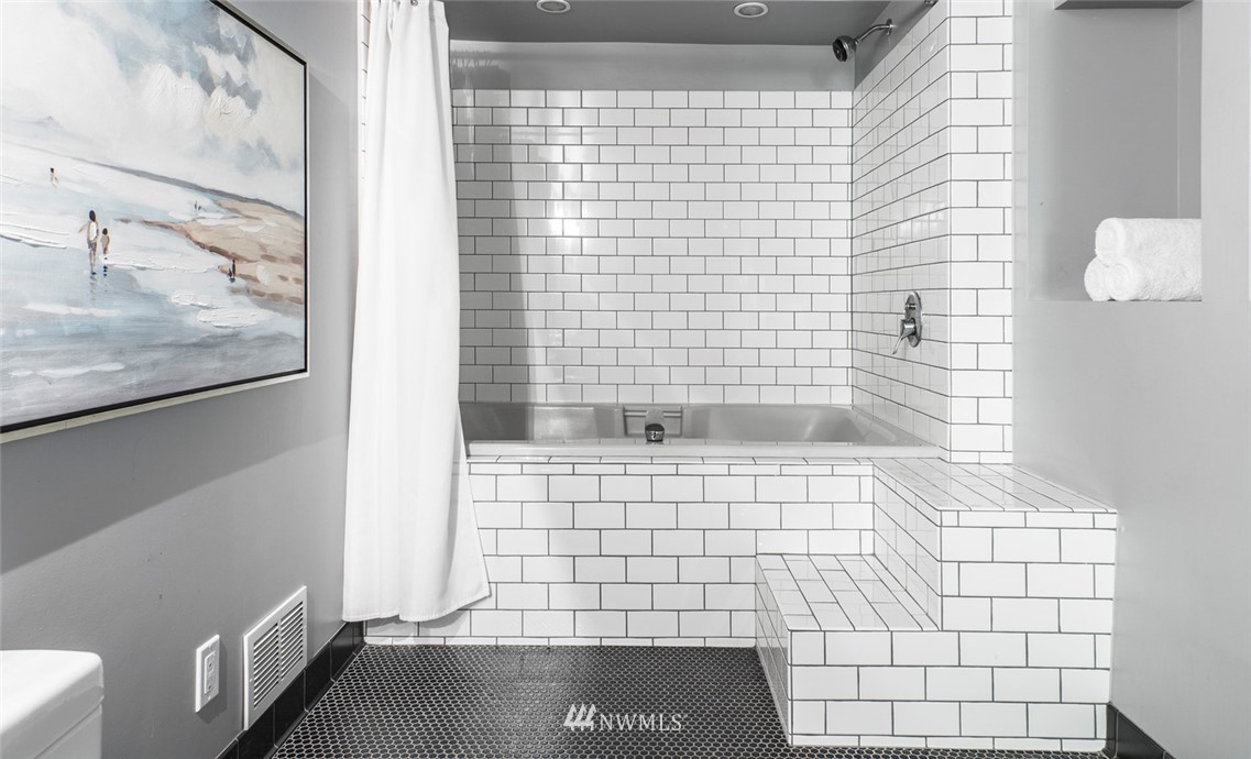 1668 East Boston Terrace Seattle, WA 98112 - Photo 17 of 24 a bathroom with a shower