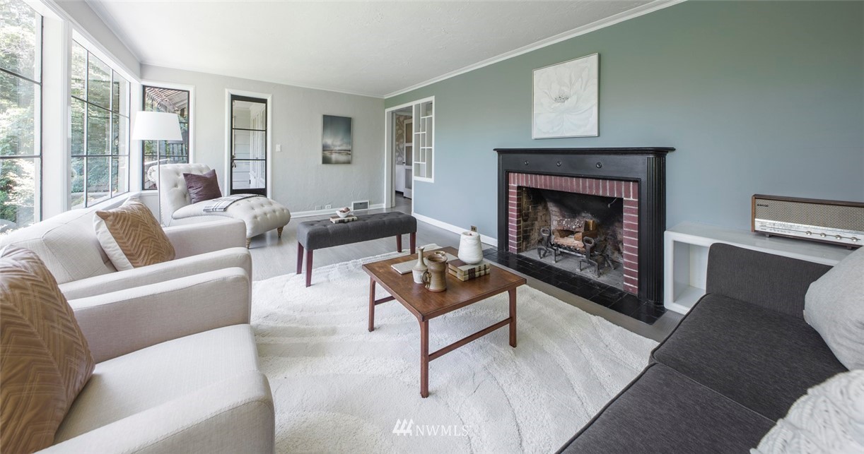 1668 East Boston Terrace Seattle, WA 98112 - Photo 3 of 24 a living room with furniture and a fireplace