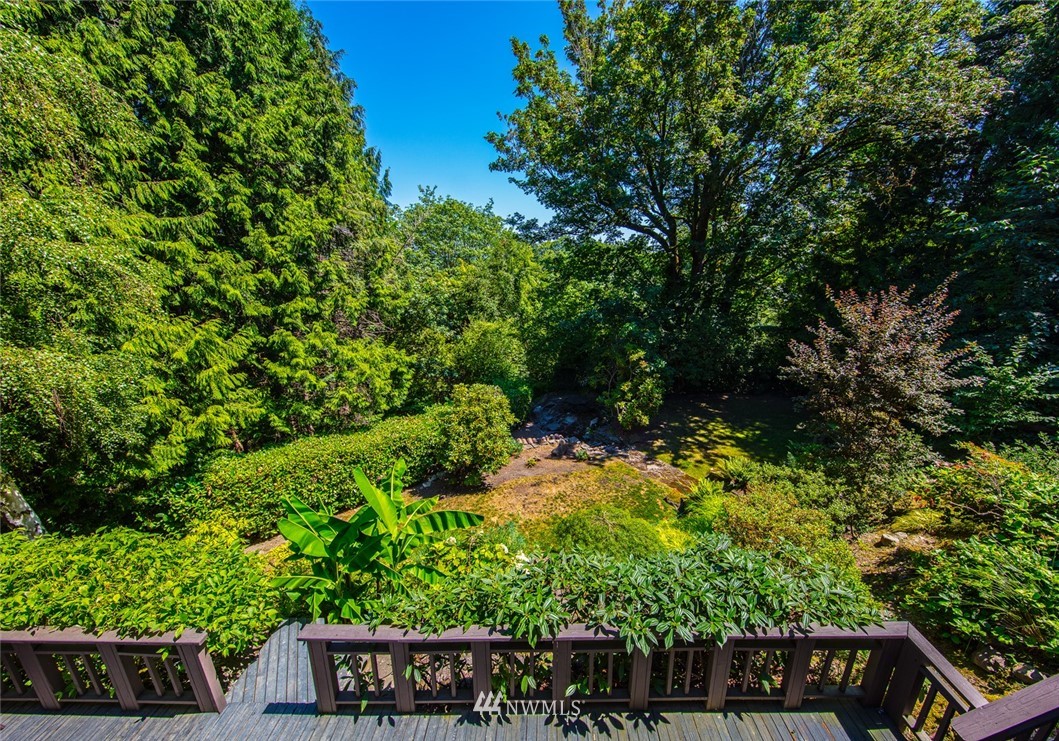 1668 East Boston Terrace Seattle, WA 98112 - Photo 24 of 24 a view of a wooden house with a tree