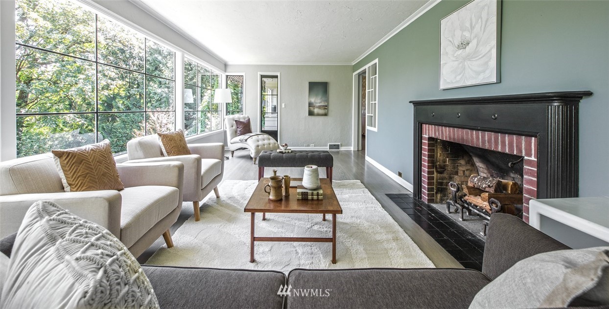 1668 East Boston Terrace Seattle, WA 98112 - Photo 4 of 24 a living room with furniture and a fireplace