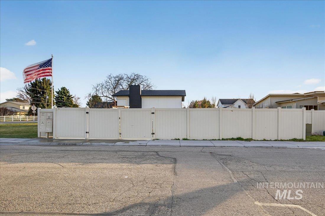 4393 North Edelweiss Street Boise, ID 83713 - Photo 38 of 42 View of asphalt street featuring a gate