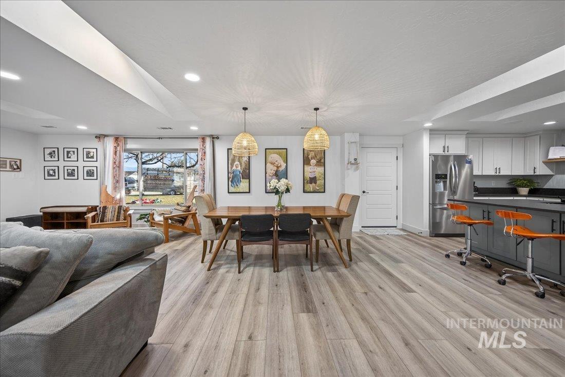 4393 North Edelweiss Street Boise, ID 83713 - Photo 9 of 42 Dining area with recessed lighting and light wood-type flooring