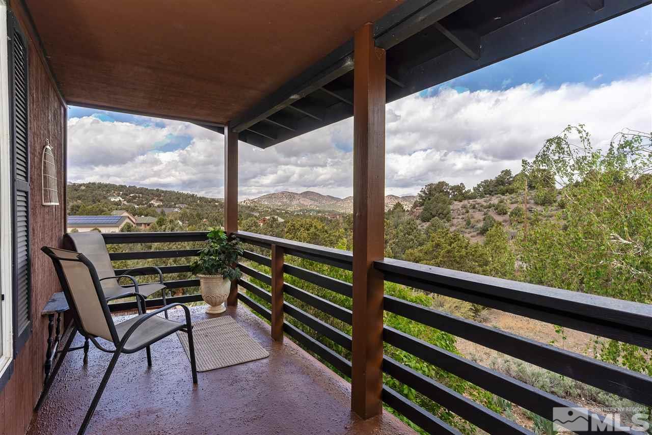 1844 Lousetown Road Reno, NV 89521 - Photo 18 of 39 a view of a two chairs in the balcony