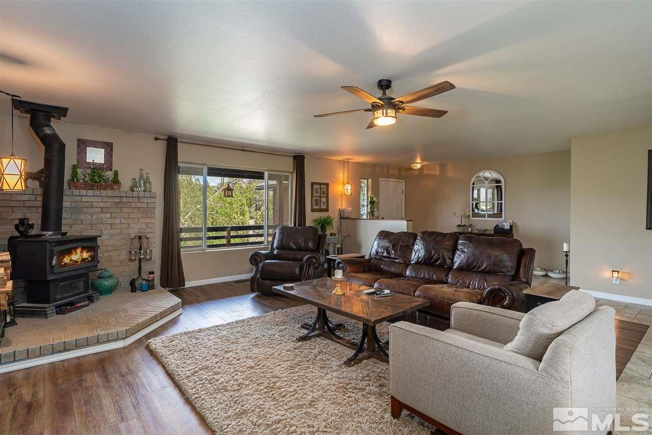 1844 Lousetown Road Reno, NV 89521 - Photo 4 of 39 a living room with furniture and a fireplace