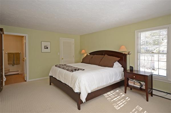 16 Nicholas Road Hopkinton, MA 01748 - Photo 14 of 28 a bedroom with a bed and window