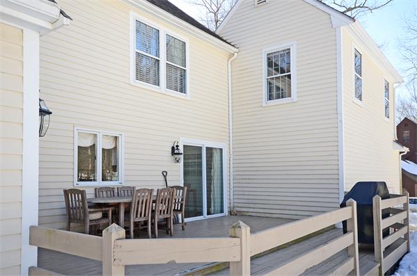 16 Nicholas Road Hopkinton, MA 01748 - Photo 26 of 28 a view of a patio with table and chairs