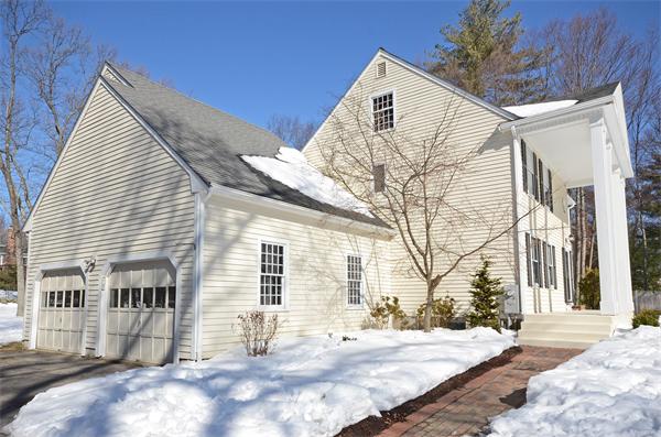 16 Nicholas Road Hopkinton, MA 01748 - Photo 3 of 28 a view of a house with a yard