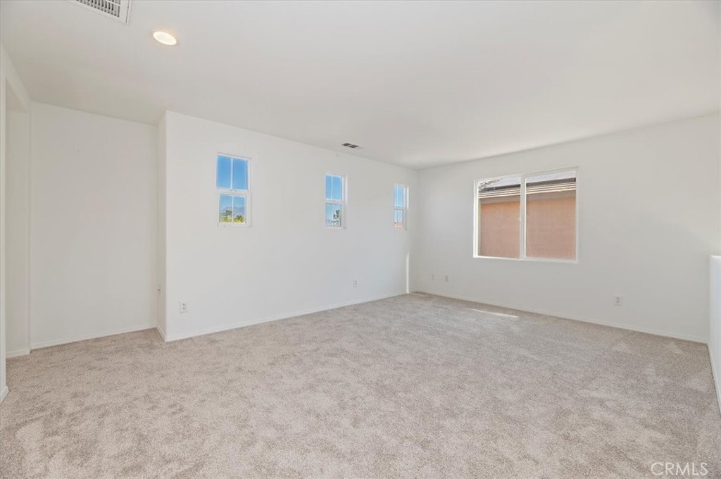 3215 Tumbleweed Road Hemet, CA 92545 - Photo 25 of 46 an empty room with windows