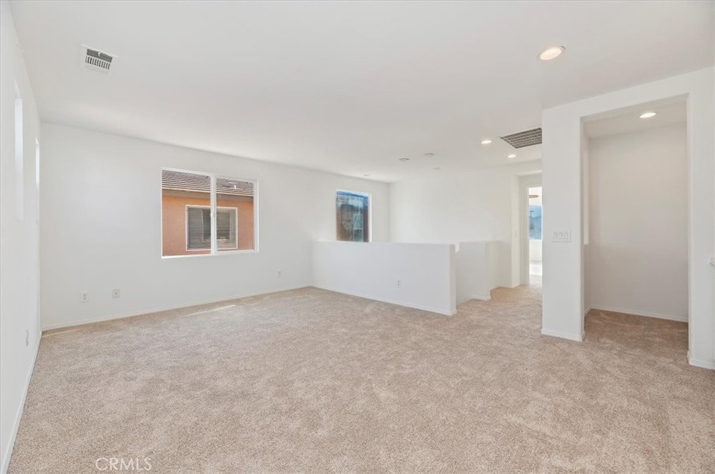 3215 Tumbleweed Road Hemet, CA 92545 - Photo 27 of 46 a view of an empty room with a window