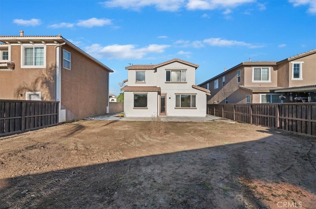3215 Tumbleweed Road Hemet, CA 92545 - Photo 40 of 46 a front view of a house with garage