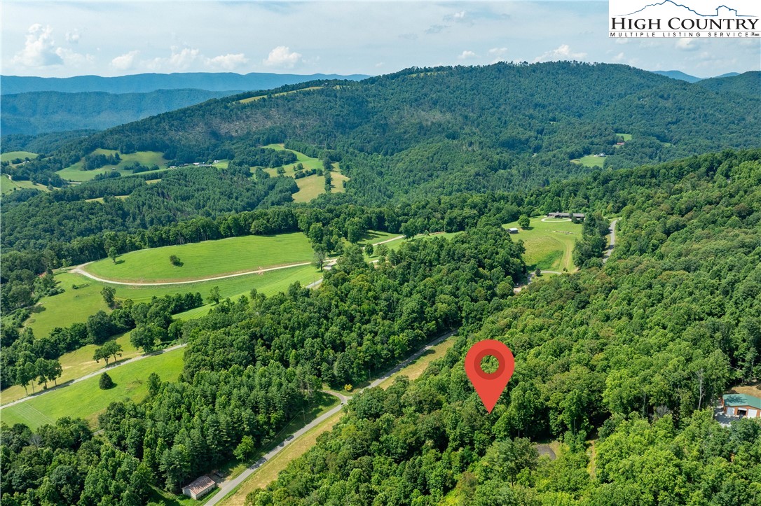 Lot 30 Lake Ridge Butler, TN 37640 - Photo 11 of 30 a view of a field with an ocean and trees