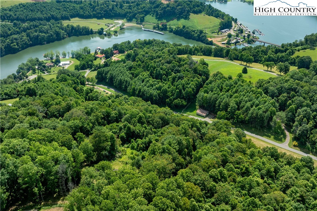 Lot 30 Lake Ridge Butler, TN 37640 - Photo 20 of 30 an aerial view of a house with a yard and lake view
