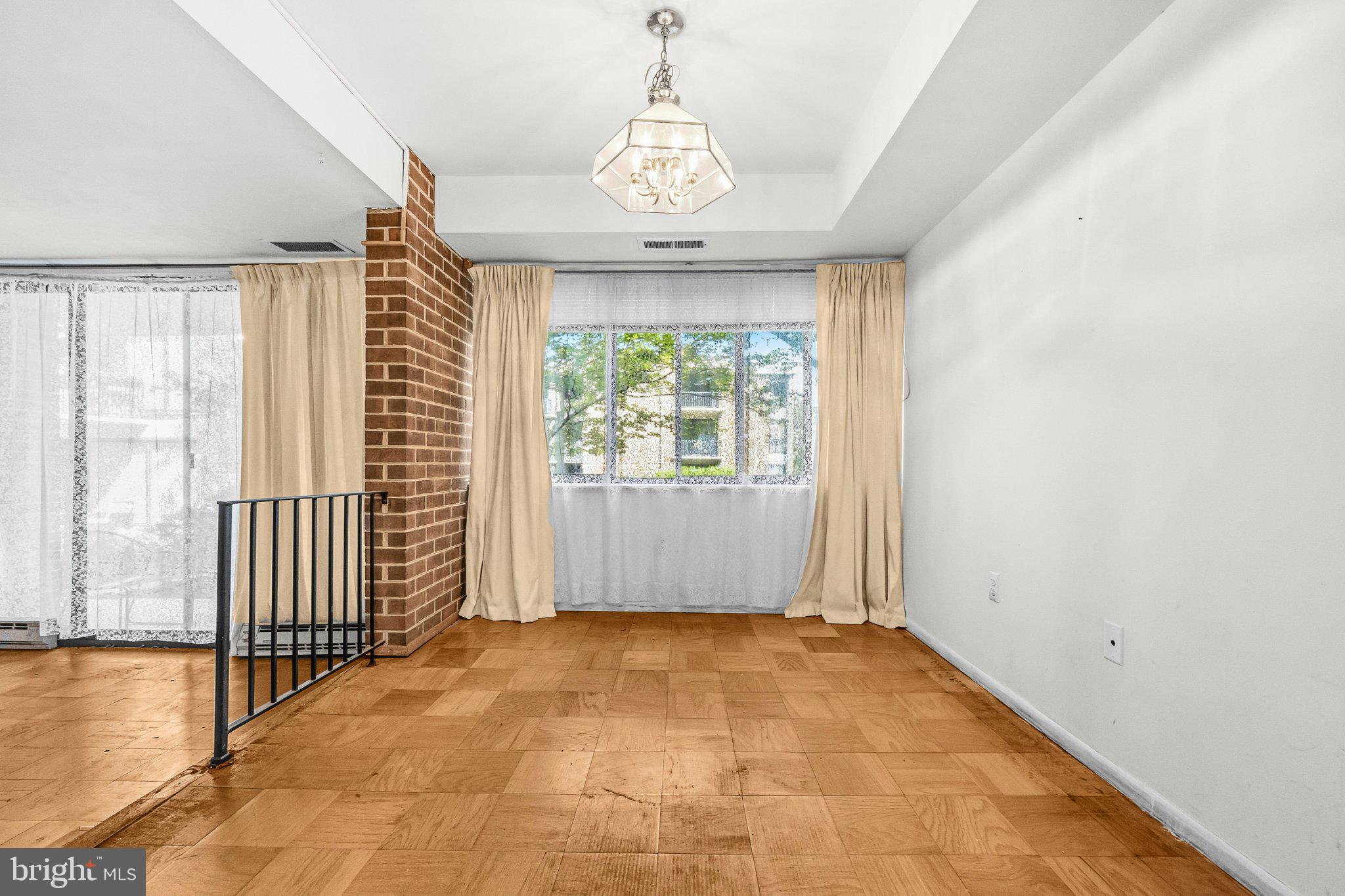 2103 Walsh View Terrace, Unit 102 Silver Spring, MD 20902 - Photo 12 of 30 Bright and airy living space awaits.