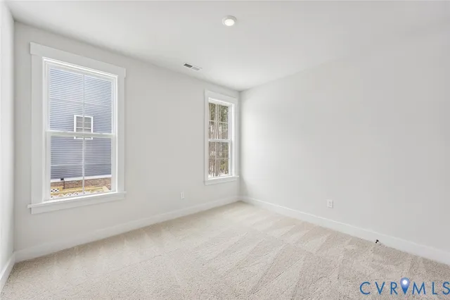 a bathroom with a bathtub a sink a vanity and a shower