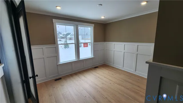 a kitchen with stainless steel appliances granite countertop a stove and a refrigerator