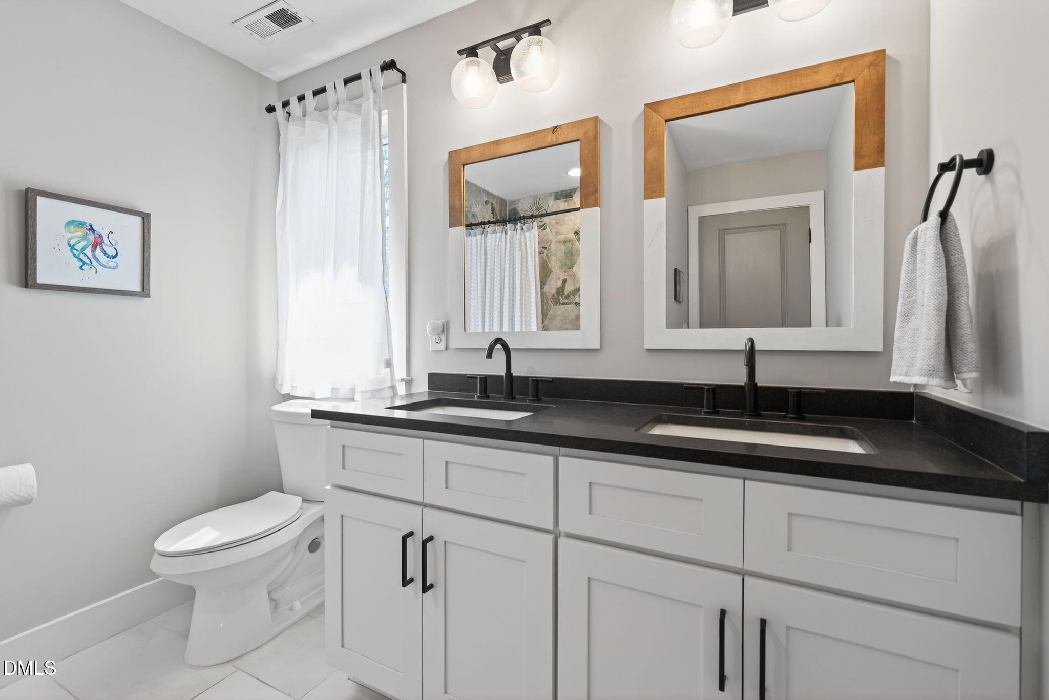213 Lincoln Court Raleigh, NC 27610 - Photo 34 of 40 a bathroom with a granite countertop sink a toilet and a mirror