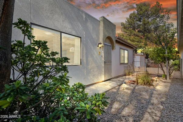 a view of backyard of a house
