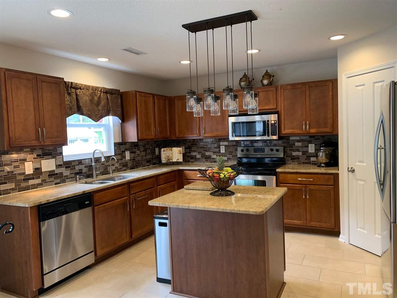 6821 Harter Court Raleigh, NC 27610 - Photo 4 of 27