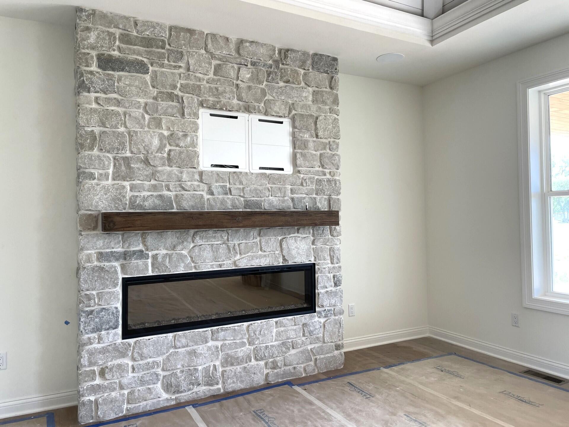W358-n6309 W358-n6309 Ennis Road Oconomowoc, WI 53066 - Photo 9 of 47 Electric Fireplace w/ Stone Detail