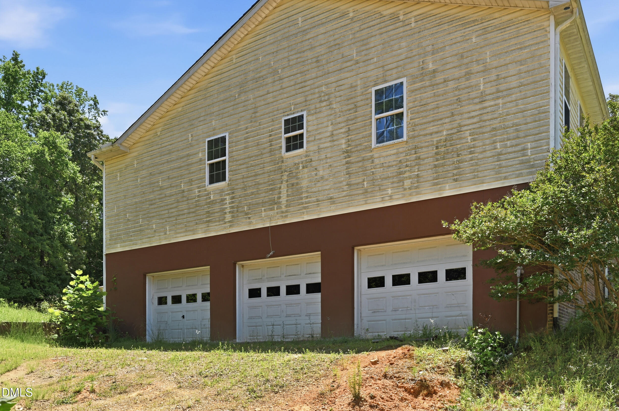 129 Shaman Drive Spring Hope, NC 27882 - Photo 7 of 43 a front view of a house with a yard