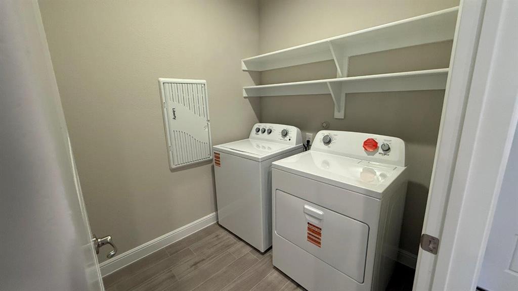 1918 Jackson Street Cleburne, TX 76033 - Photo 11 of 20 a utility room with dryer and washer
