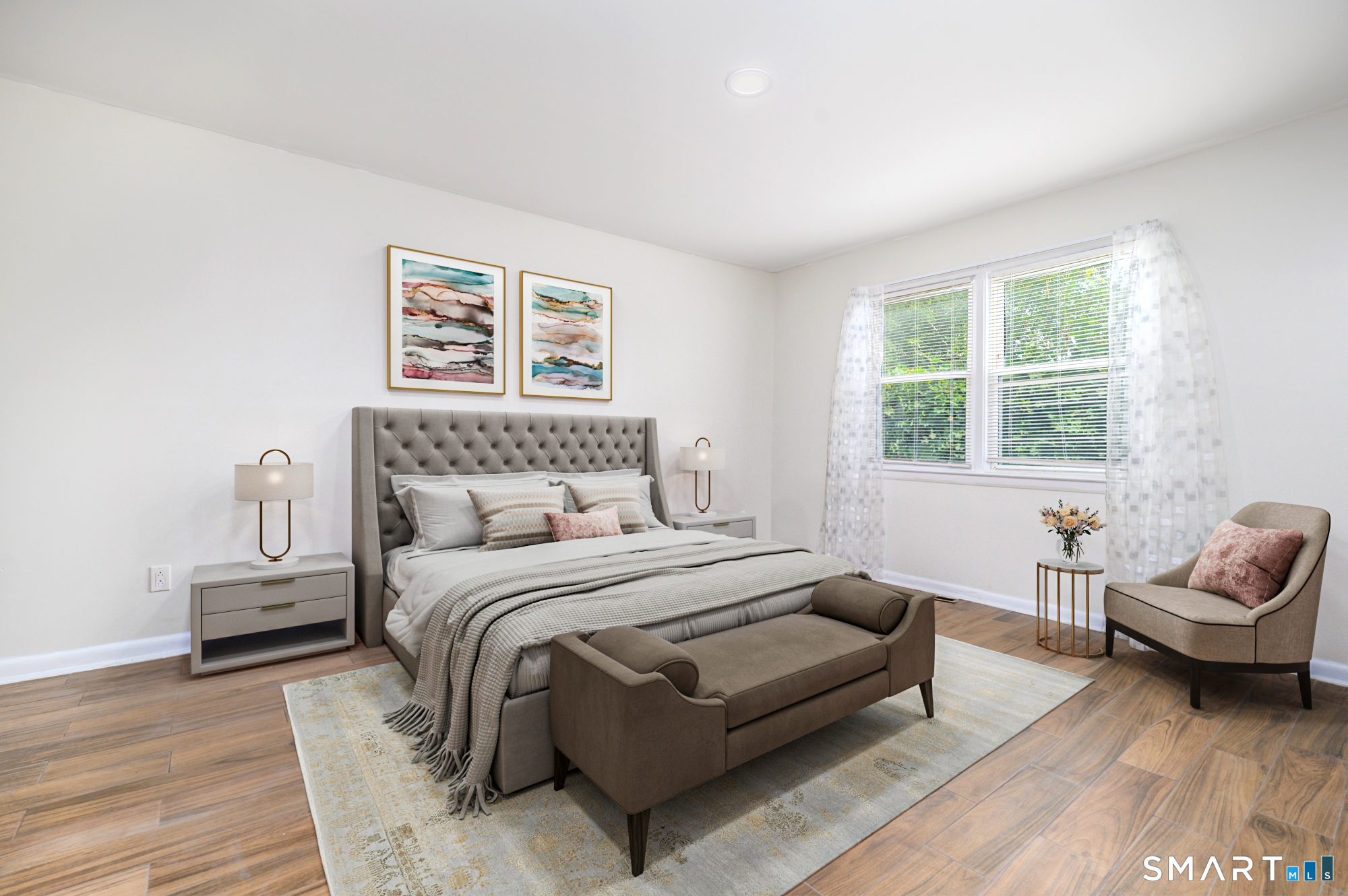 472 Anton Street Bridgeport, CT 06606 - Photo 13 of 23 a bedroom with a bed and a couch