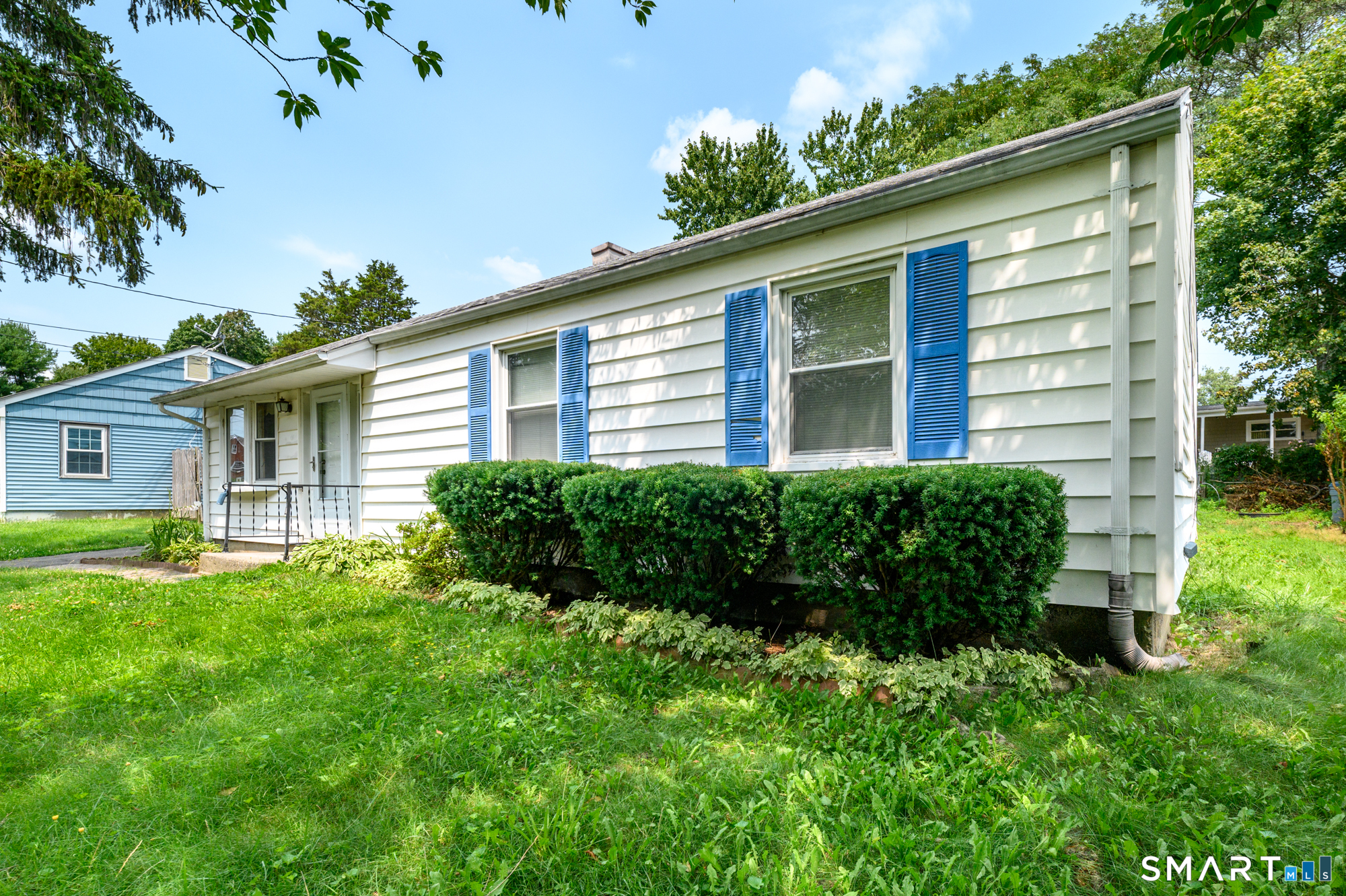 472 Anton Street Bridgeport, CT 06606 - Photo 2 of 23 front view of a house with a yard