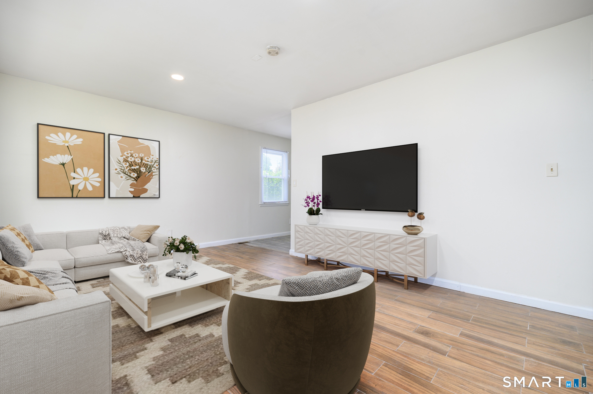 472 Anton Street Bridgeport, CT 06606 - Photo 5 of 23 a living room with couch and a flat screen tv