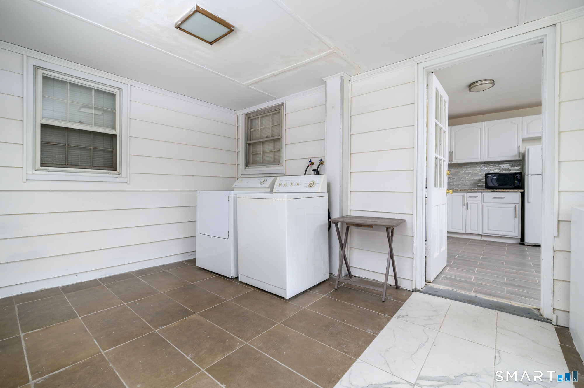 472 Anton Street Bridgeport, CT 06606 - Photo 8 of 23 a view of a storage & utility room and utility room