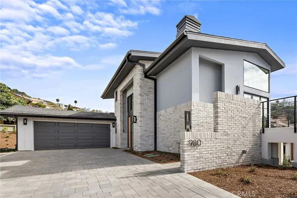 a white house with a outdoor space